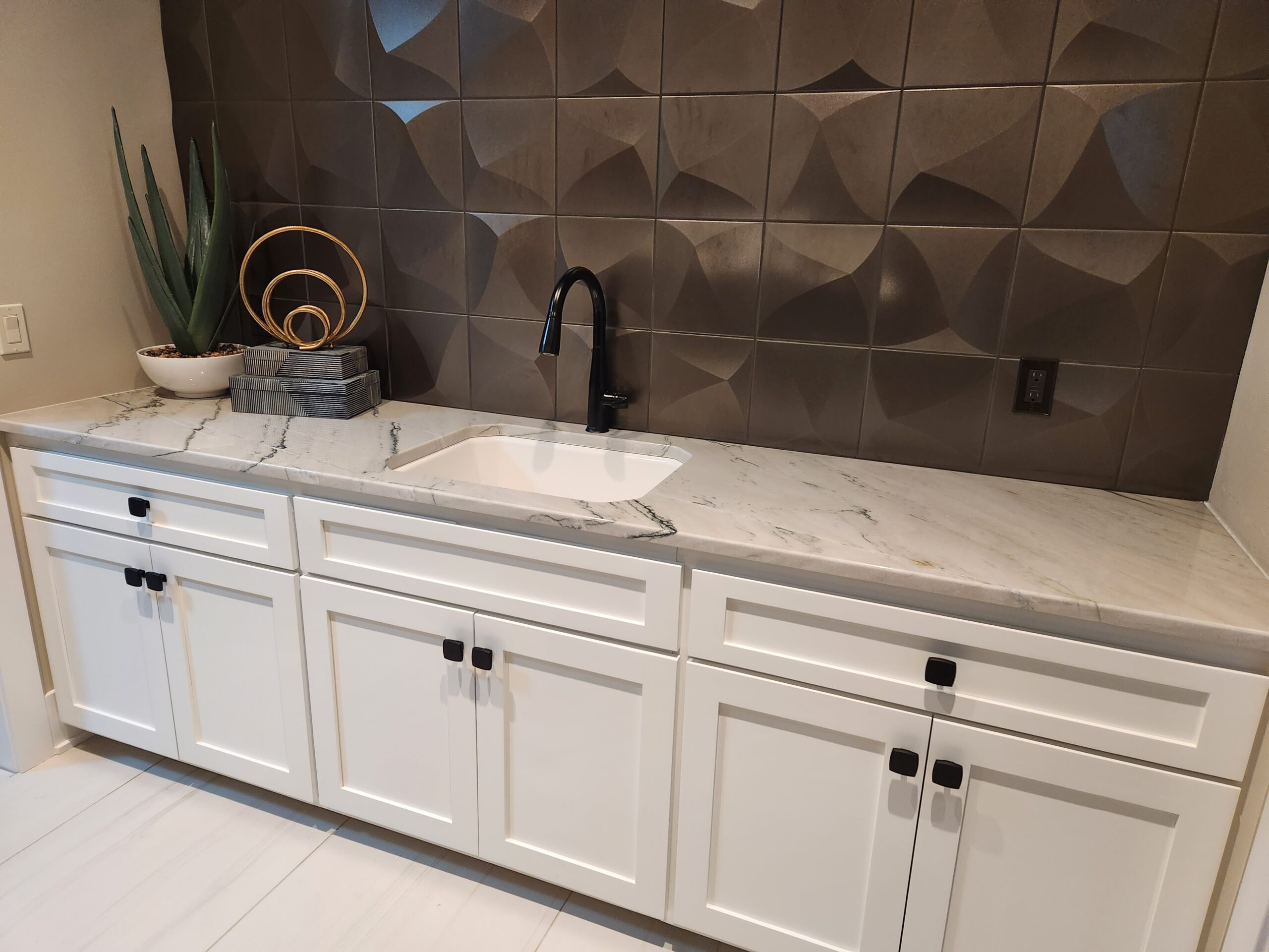 Custom vanity and sink detail in an Omaha bathroom