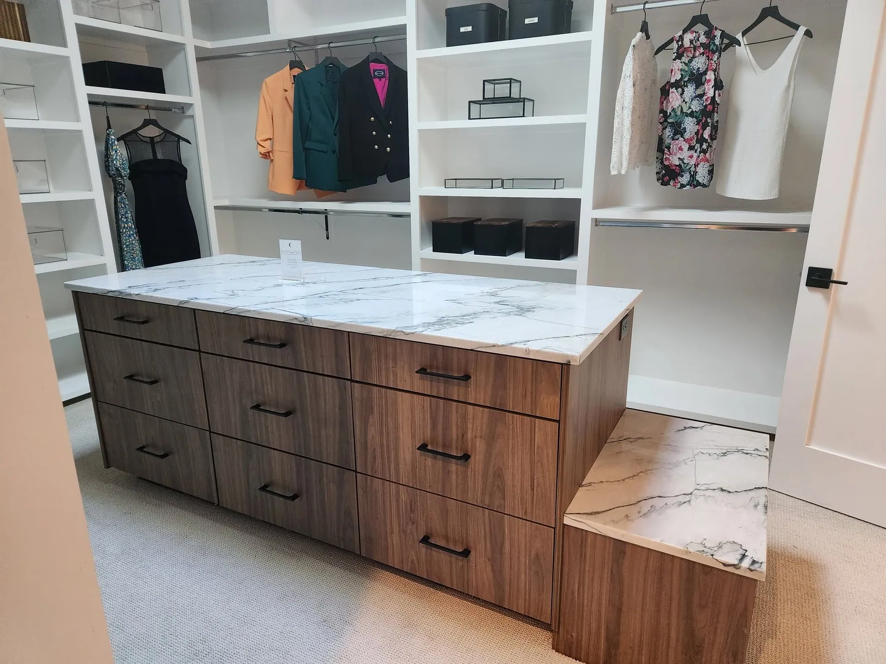 Custom walk-in closet with a center island
