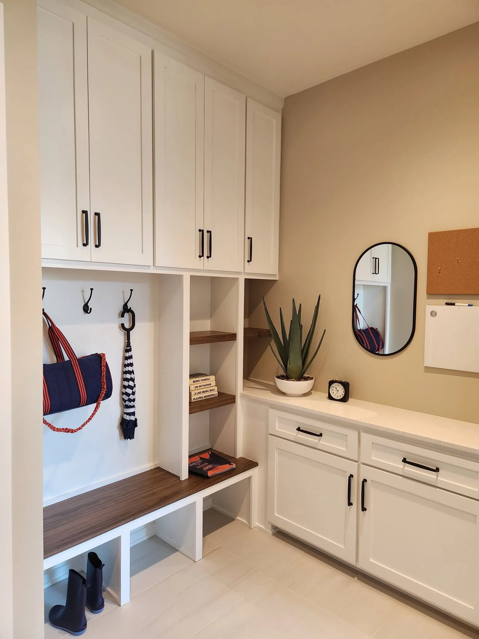 Mudroom lockers with hooks and a built-in bench