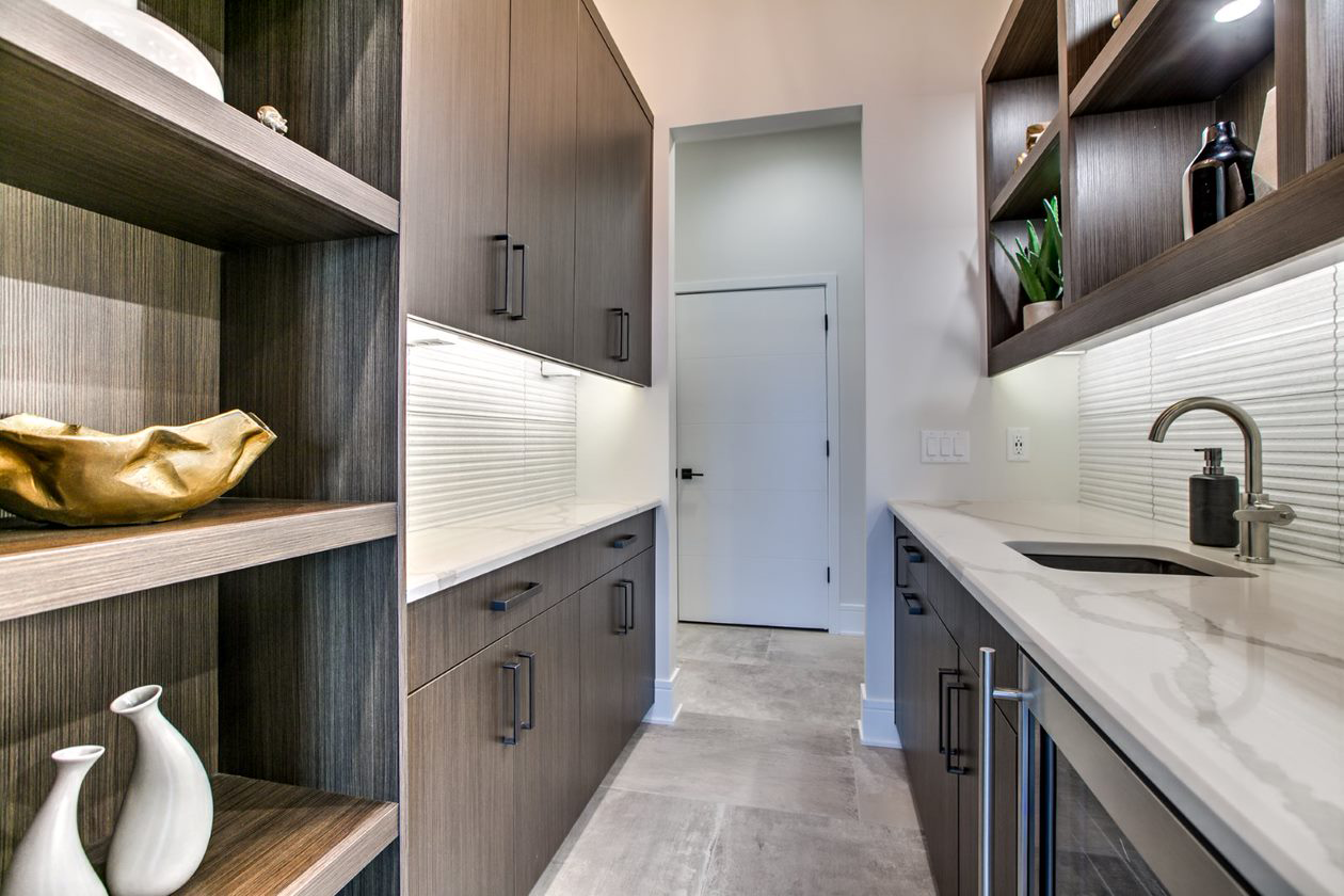 Custom kitchen island with bar seating and integrated storage