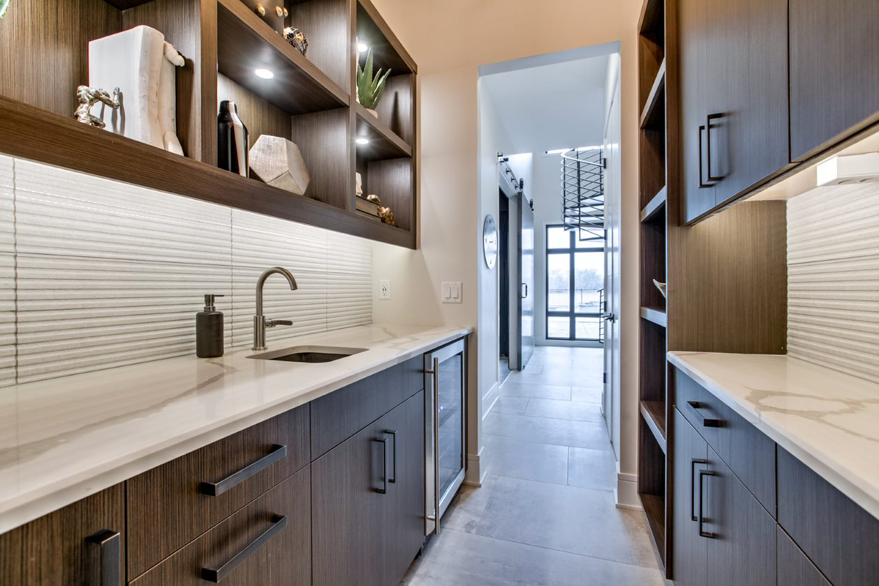 Detail of custom cabinet drawers and hardware in a modern kitchen